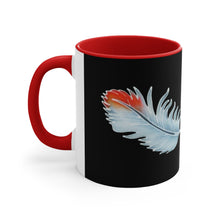 African Grey Parrot Feathers Mug. The handle is red and on the left (in this photo), the mug's interior is a bright red and the grey feather, tipped with red at the top,  lays diagonally towards the handle on a black background. The is a vertical white stripe separating the mug's design from the handle. You can clearly see the batik lines and handpainted shadings that the print is copied from.