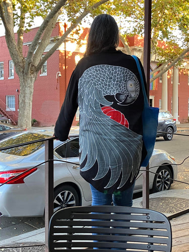This customer wrote me and said she got a lot of compliments about her jacket! The African Grey parrot is batiked and painted by hand on the back of the jacket.