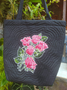 Handpainted batik shoulder bag with a lovely design of a bouquet of red roses batiked and handpainted onto the front of the bag.
