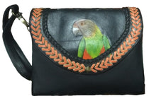 Handtooled, handpainted leather clutch (with matching strap) of a Senegal parrot. On black leather with tan-colored V trim and black trim between the bird and the tan trim.