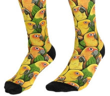 Repeating pattern of Sun Conure parrots.  Only their heads, upper torso and wings are visible.