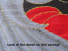 Close-up of painted details on the African Grey hand-painted batik sarong