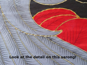 Close-up of painted details on the African Grey hand-painted batik sarong