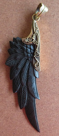 Hand-carved black bone wing pendant jewelry