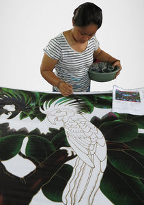 Hand-painting the Black Palm Cockatoo parrot sarong