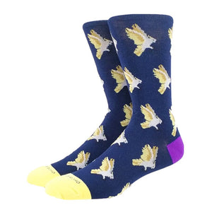 Flying cockatoos set against a medium blue background. Socks accented with yellow toes and purple heels.  