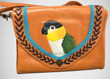 Black-headed caique hand-tooled, handpainted leather clutch in natural/brown/teal