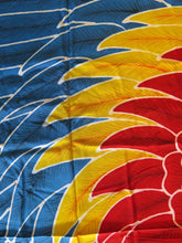 Close-up of the details on the Scarlet macaw parrot hand-painted batik sarong