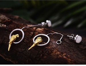 Hand-crafted sterling silver parrot drop earrings