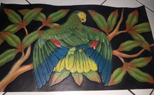 Side panel of the hand-tooled, hand-painted leather bag featuring a Double-yellow headed Amazon