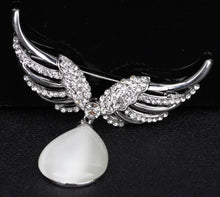 Angel wing brooch with crystal stones and an opal
